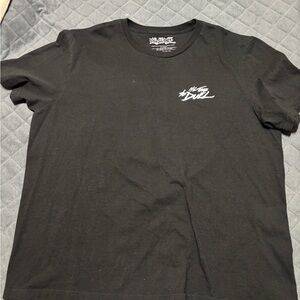 Black Graphic Tee by [Brand]